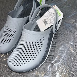 Size 7 women LiteRide crocs.